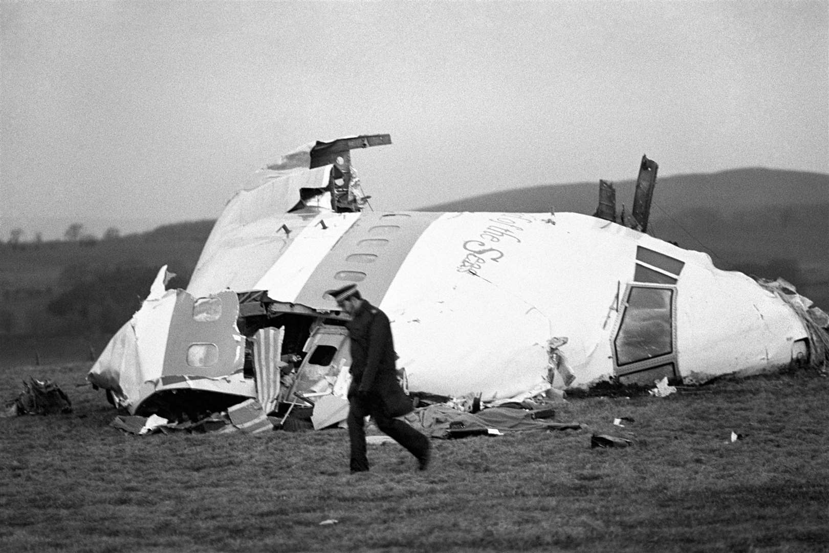The wrecked nose section of the Pan-Am Boeing 747 lies in a field at Lockerbie (PA)