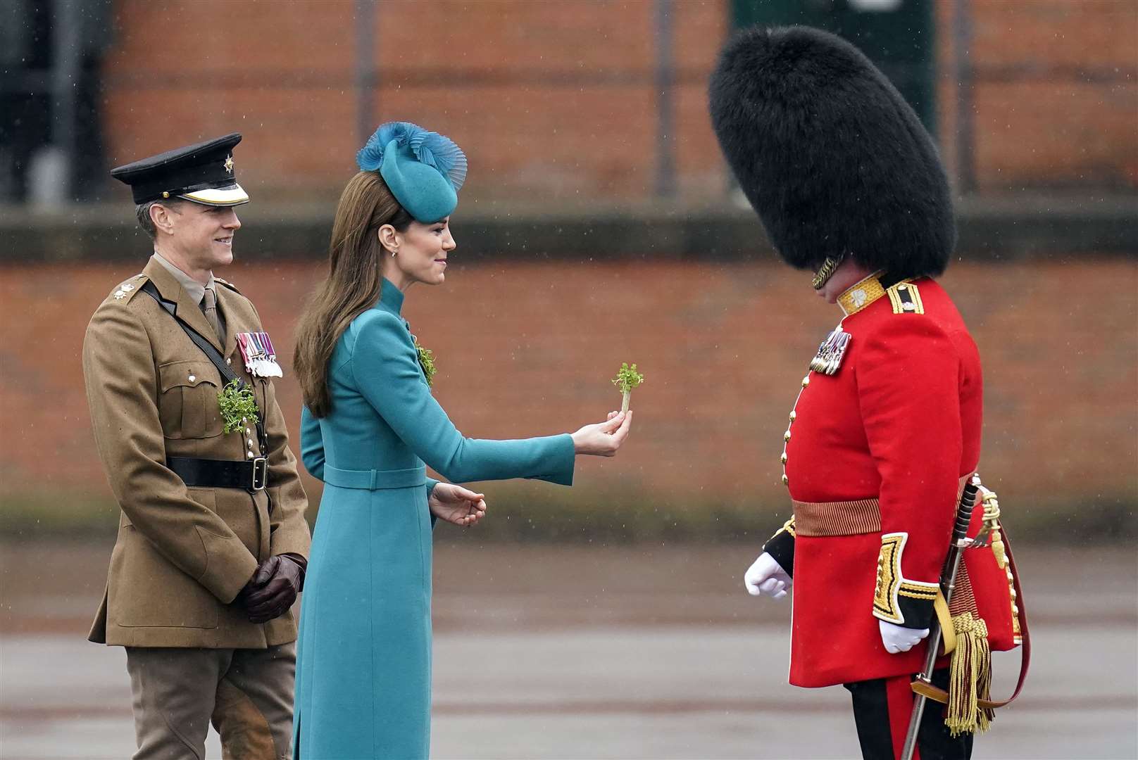 The Princess of Wales presents shamrock to officers and guardsmen of the 1st Battalion Irish Guards in Aldershot in 2023 (PA)