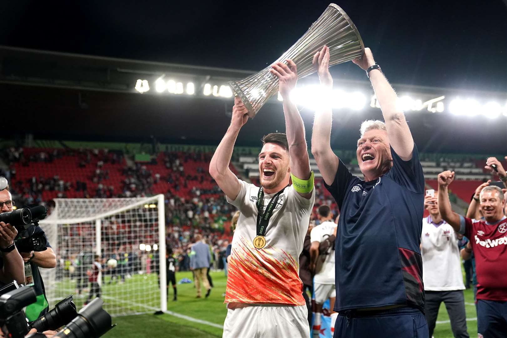 West Ham United’s Declan Rice (left) and manager David Moyes with the UEFA Europa Conference League Trophy following victory over Fiorentina in the UEFA Europa Conference League Final at the Fortuna Arena, Prague (Tim Goode, PA)