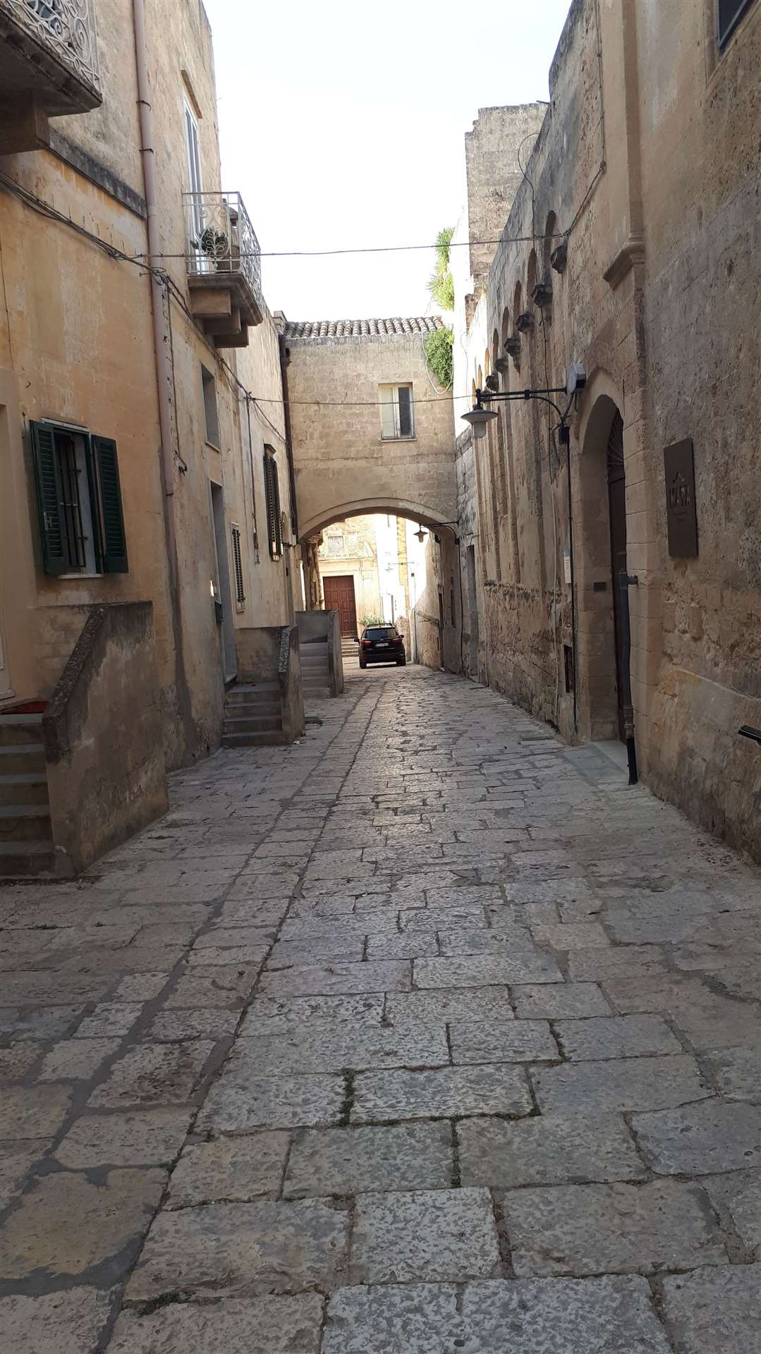 Explore the narrow alleys of Matera.