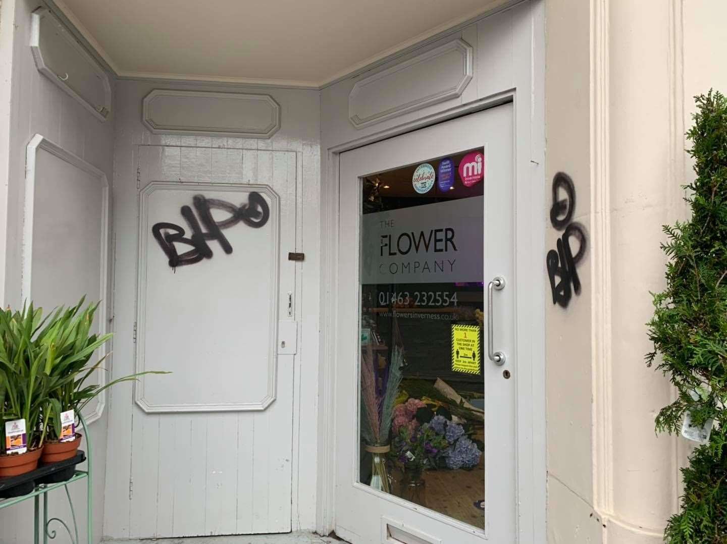 The outside of The Flower Company has been 'tagged' by vandals.