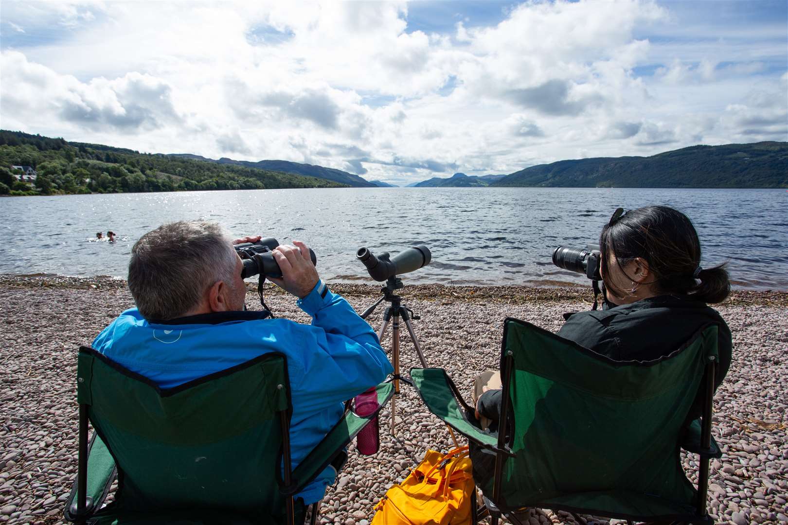 Nessie hunters take up their position for the surface search of Loch Ness.