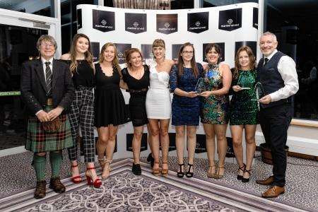 Members of the Glenurquhart women’s shinty team celebrate winning three awards at the Drumossie Hotel. Picture: Neil Paterson