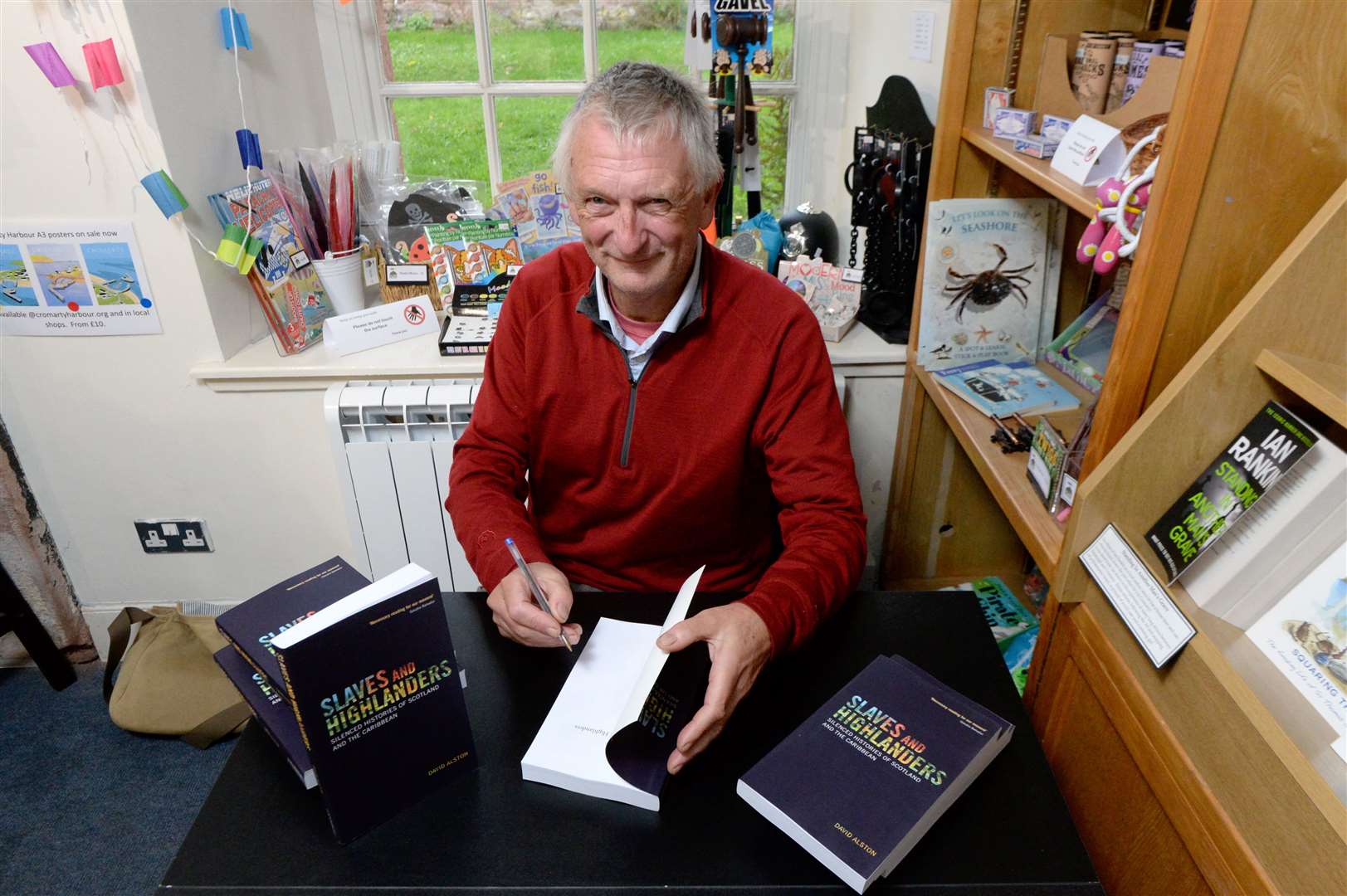 David Alston's book, Slaves and Highlanders: David Alston signing his new book. Picture: James Mackenzie.