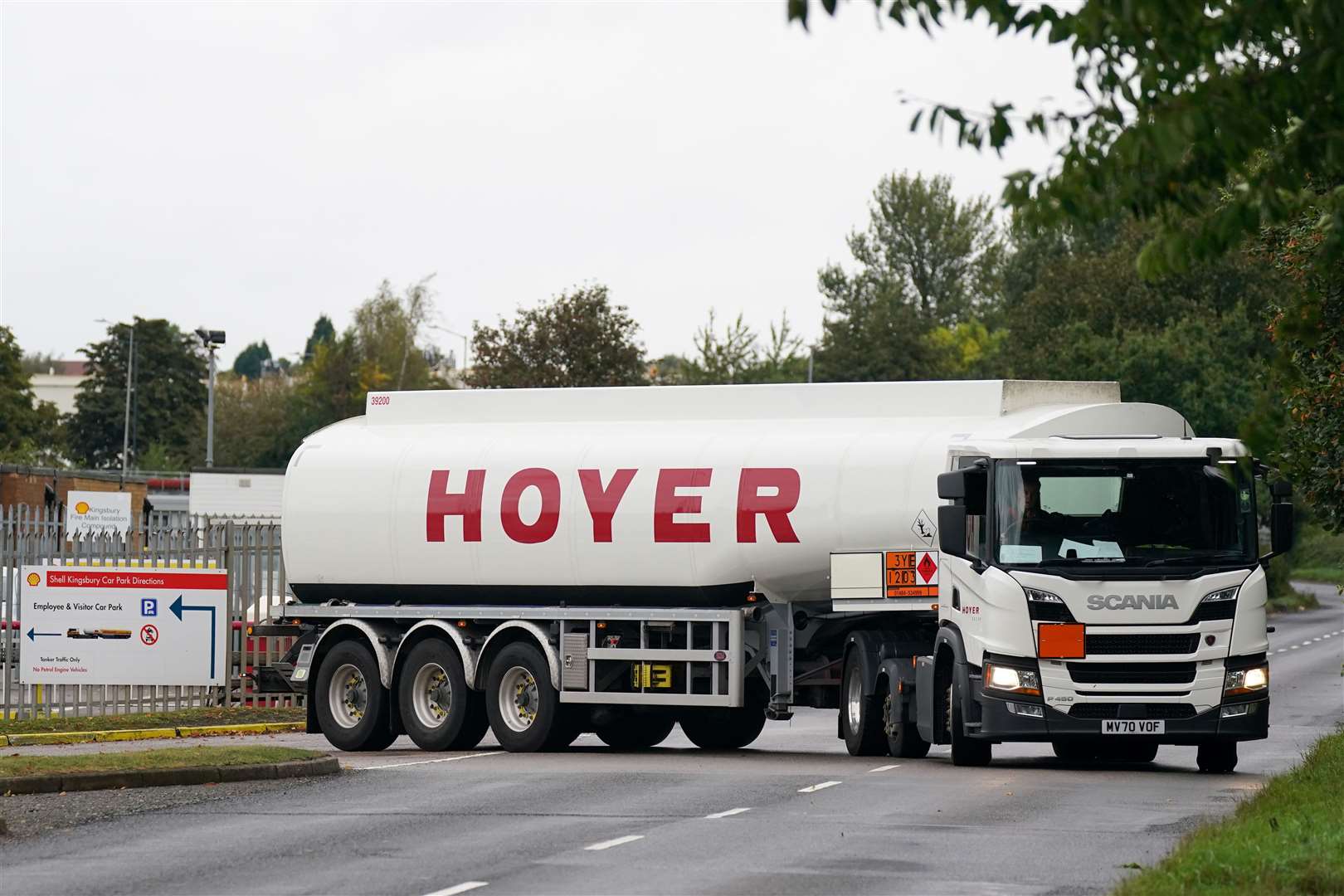 A fuel tanker leaves a Shell oil depot in Kingsbury, Warwickshire (Jacob King/PA)