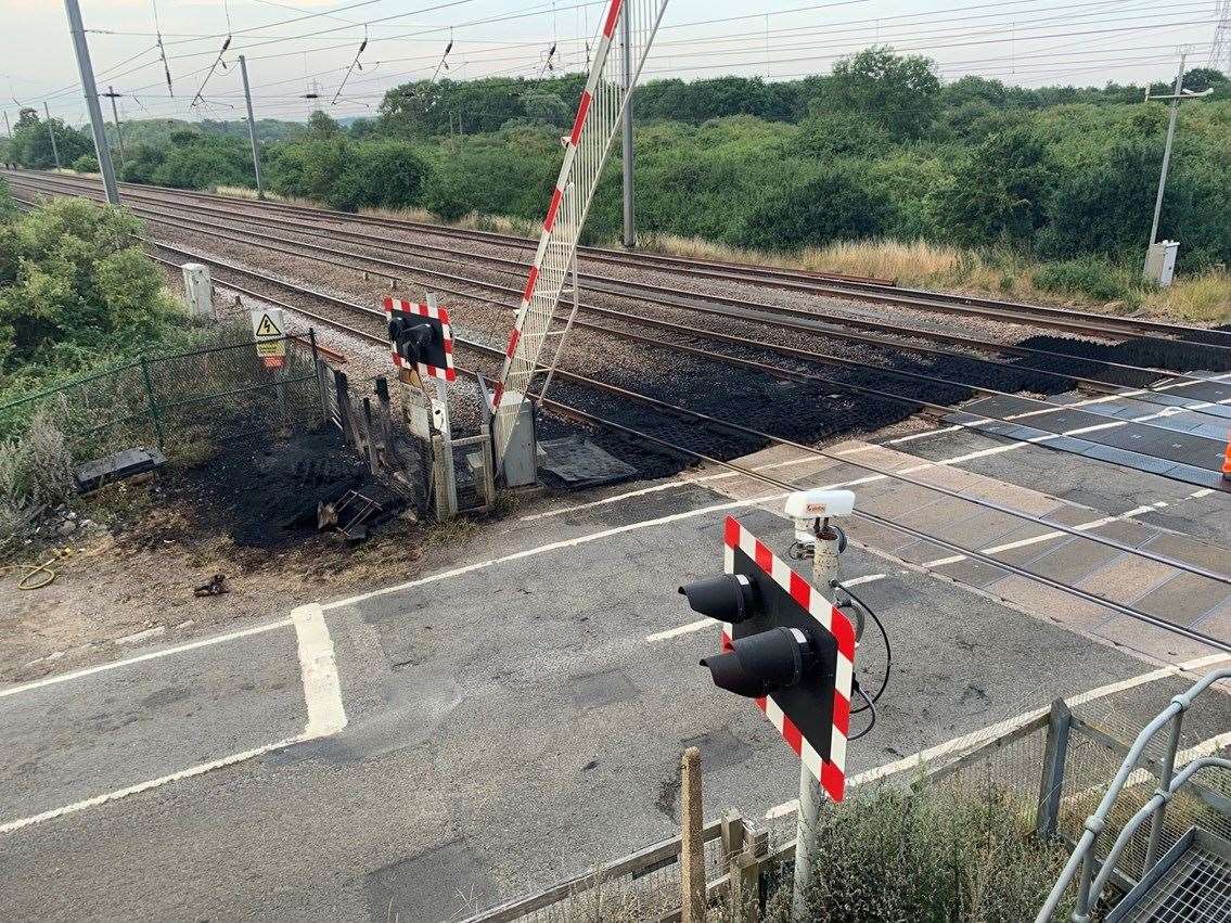 Damage at a level crossing in Sandy, Bedfordshire, which has led to severe disruption on the East Coast mainline (Network Rail/PA)