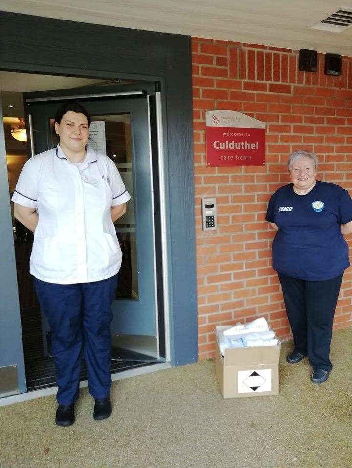 Shona Patience (right) delivers another box PPE
