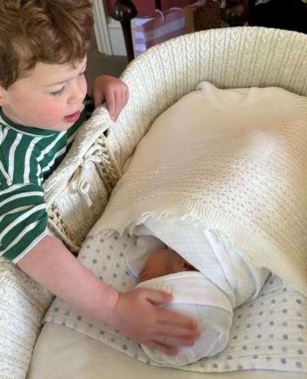 August with his baby brother (HRH Princess Eugenie/PA)