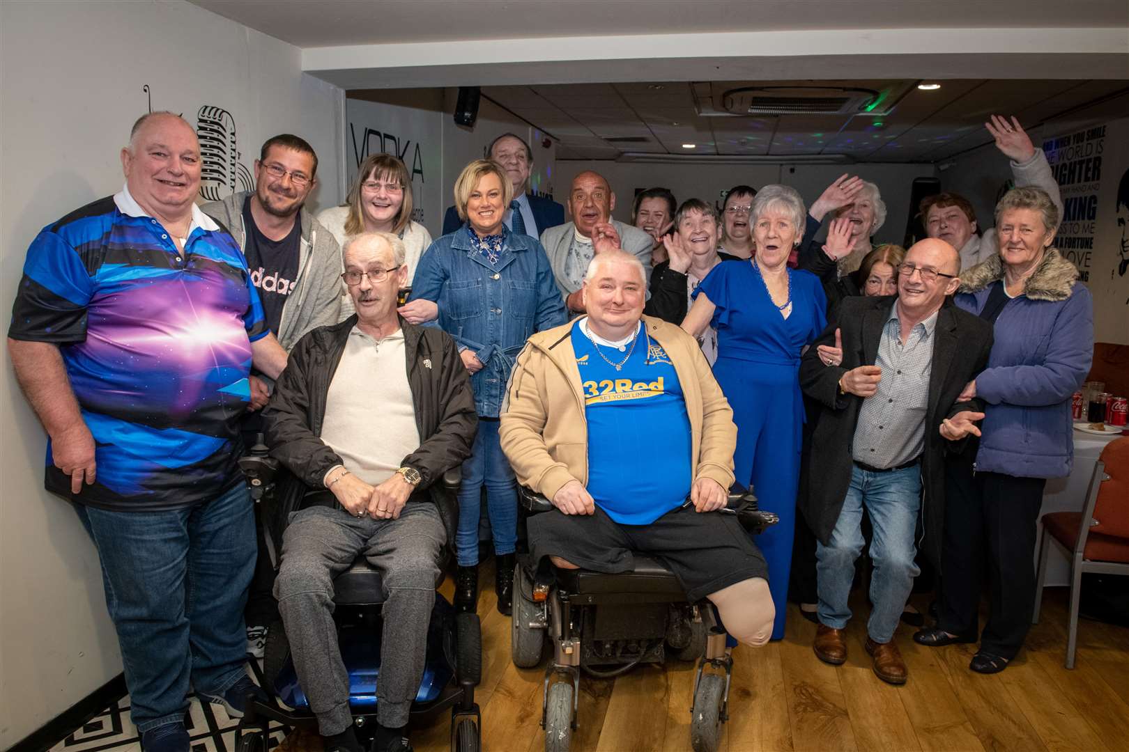 Kevin McNeil (centre, front) celebrating his 60th birthday with friends. Picture: Callum Mackay.