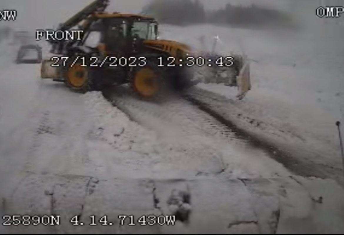 Special snow tractors in action on A9.