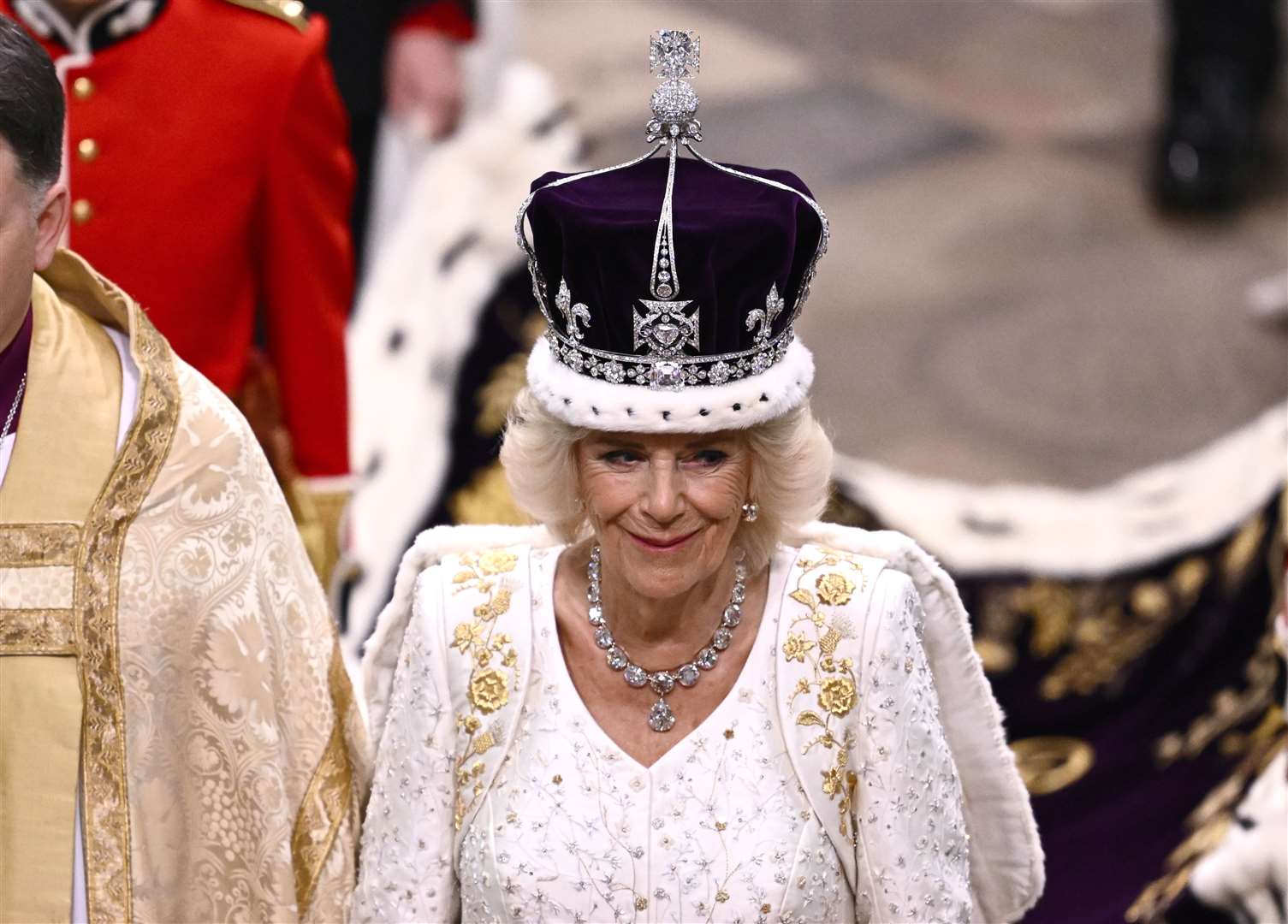 The Queen leaves Westminster Abbey after the coronation (Gareth Cattermole/PA)