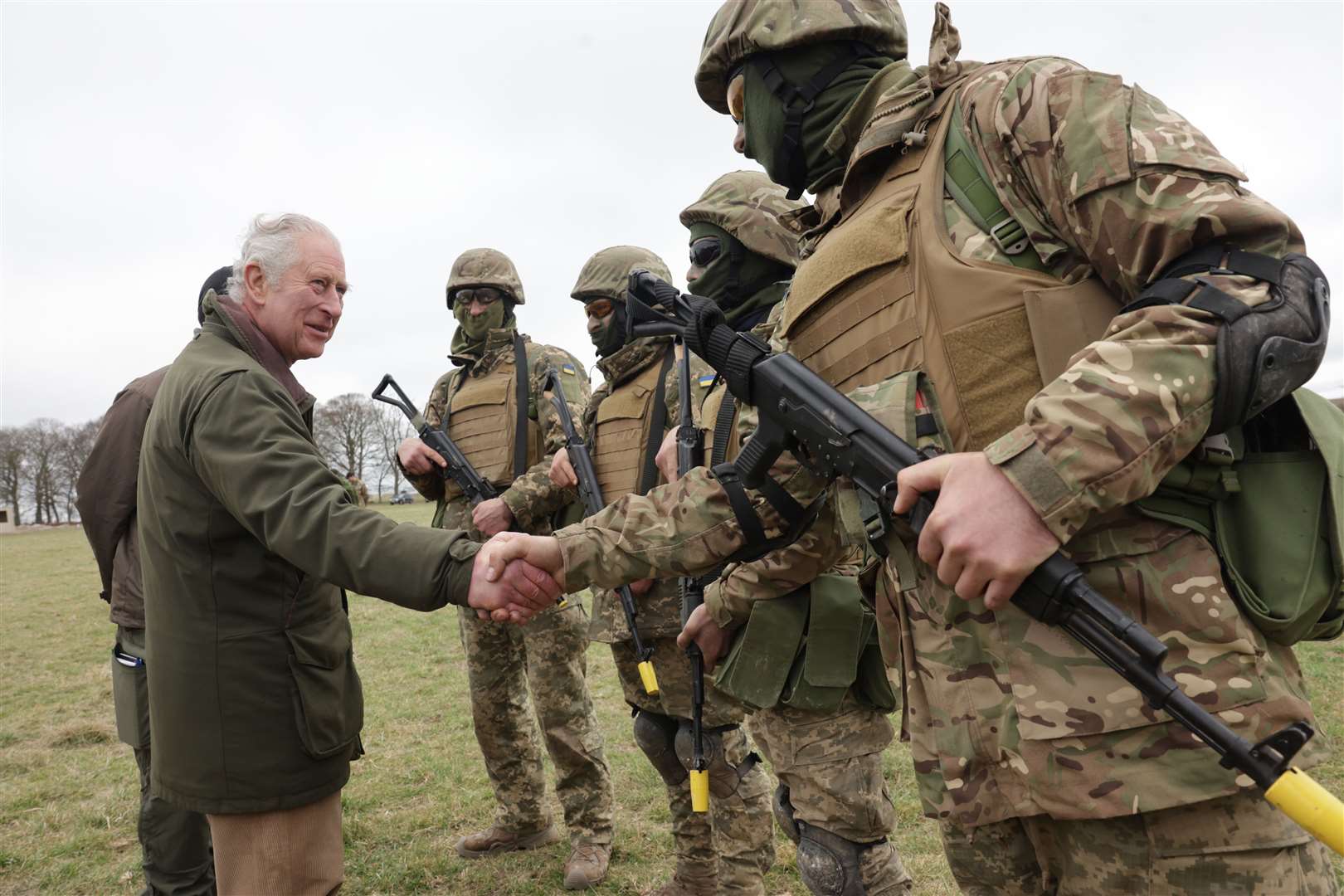 The King meets Ukrainian recruits during a visit to a training site for Ukrainian military recruits in Wiltshire (Chris Jackson/PA)