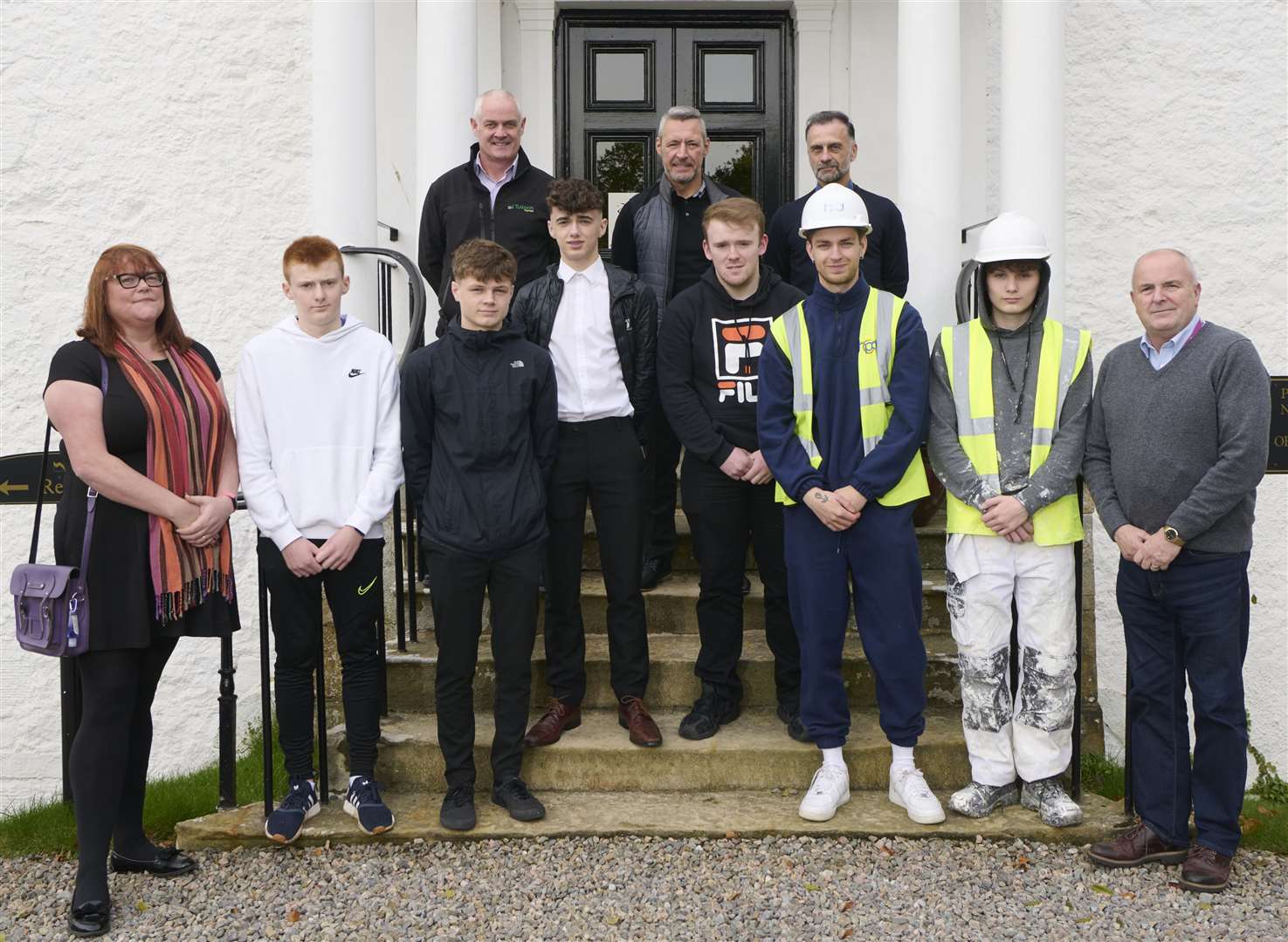 Tulloch Homes new starts and their mentors. Back row from left: Hugh MacGillivray, Gordon Macallister and Dave Macdonald. Front from left: Pauline Tuthill (Inverness College UHI), apprentices Scott Cameron, Arran Legge, Ronnie Fraser, Ewan Bremner, Riley Barclay and Dylan Lowry with David Patience (Inverness College UHI).