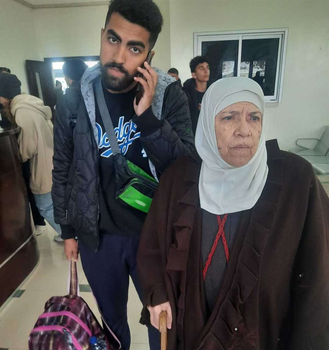 Dr Salim Ghayyda's mother Dalal and nephew, Waleed, at the border crossing.