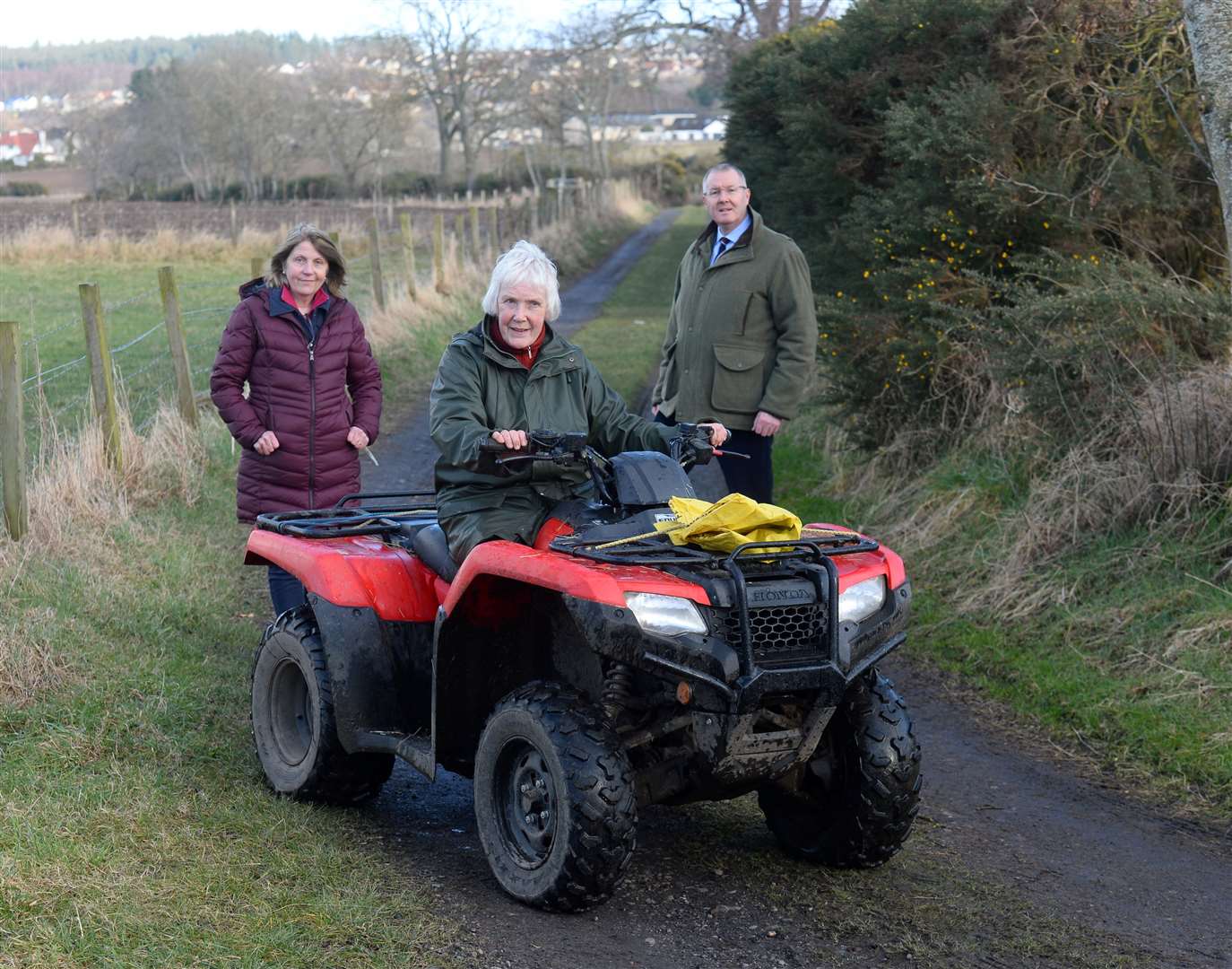 Ashton Farm road access. Carol Munro(centre) with councillors Isabelle MacKenzie and Duncan Macpherson on the road. Picture: Gary Anthony.