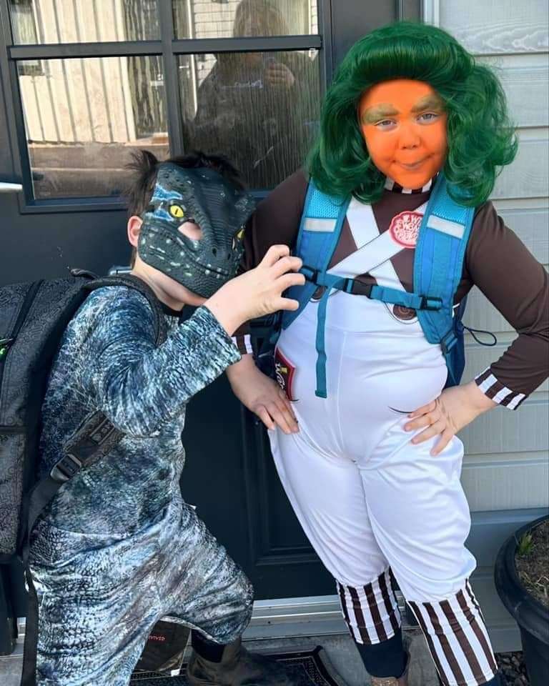 Annalise and Austin as an Oompa Loompa and Raptor Blue.