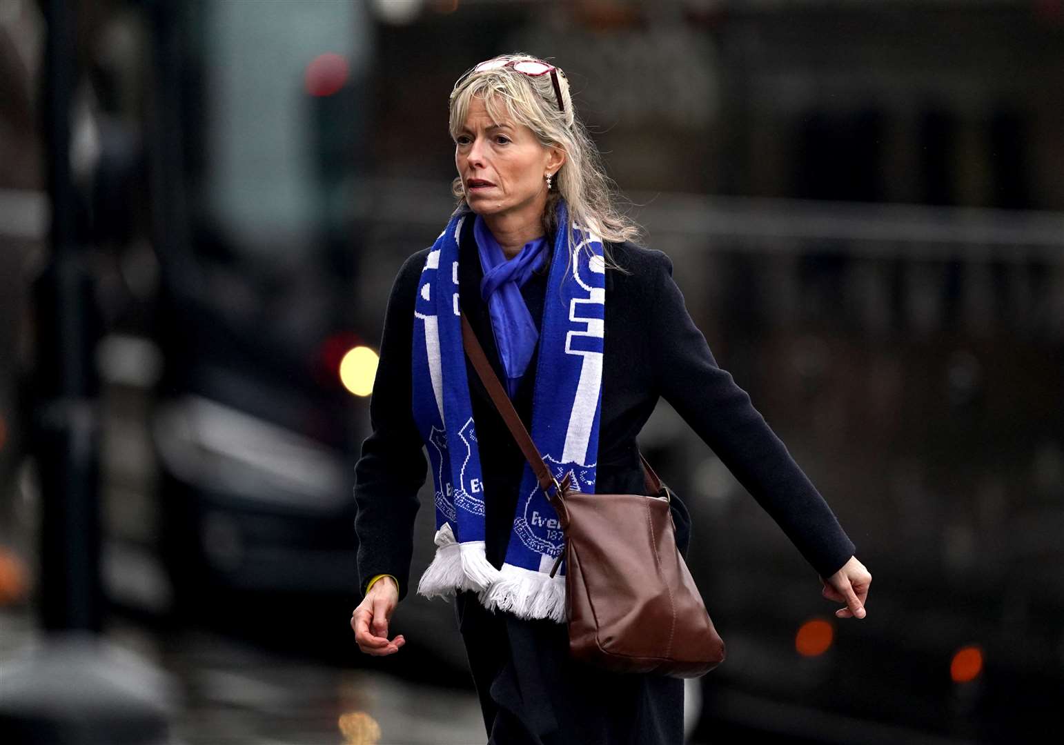 Kate McCann arrives in an Everton scarf (Martin Rickett/PA)