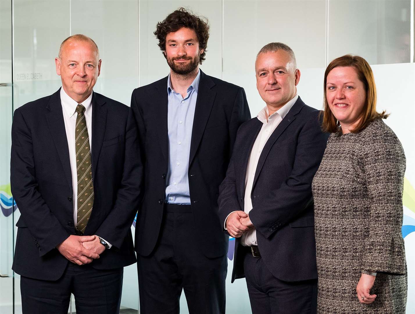 SSEN’s Colin Nicol (left) and Lyndsey Stainton (right) with Jamie Stewart and Derek Mitchell of Citizens Advice Scotland.