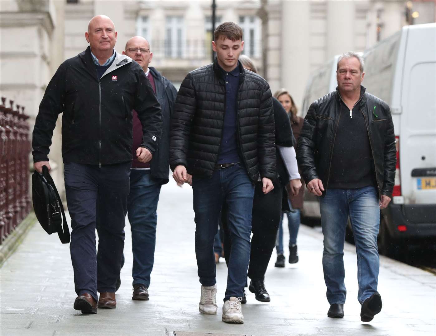Tim Dunn (second left), the father of Harry Dunn, with Harry’s stepfather Bruce Charles (right) and family spokesman Radd Seiger (left) as they arrive at the Foreign and Commonwealth Office for a meeting with Foreign Secretary Dominic Raab (Jonathan Brady/PA)