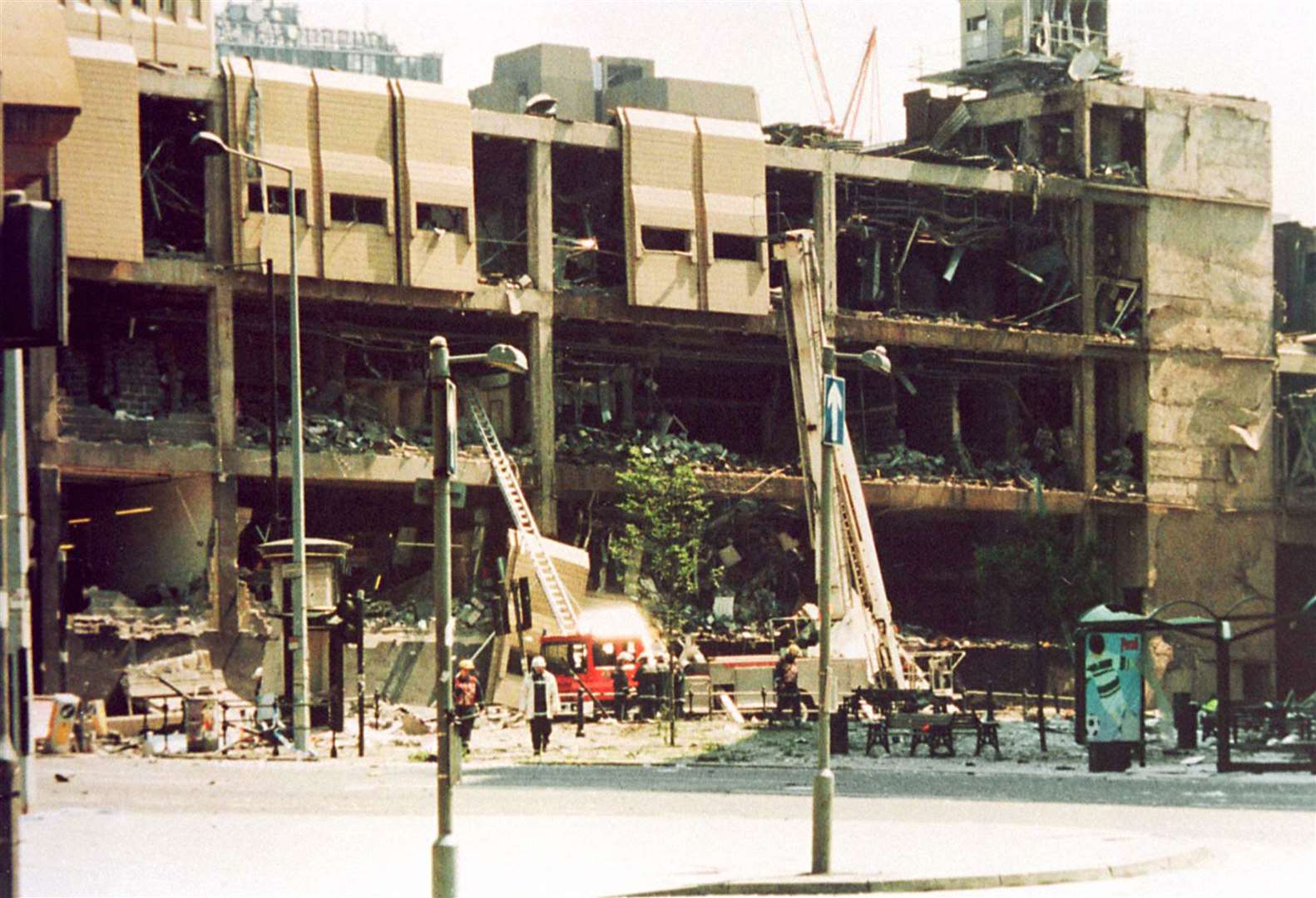 Bomb damage to the Arndale centre in Manchester city centre (PA)