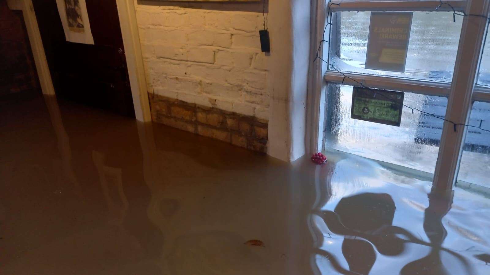 Water reached the windows inside The Boat Inn (Mario Thomas/PA)