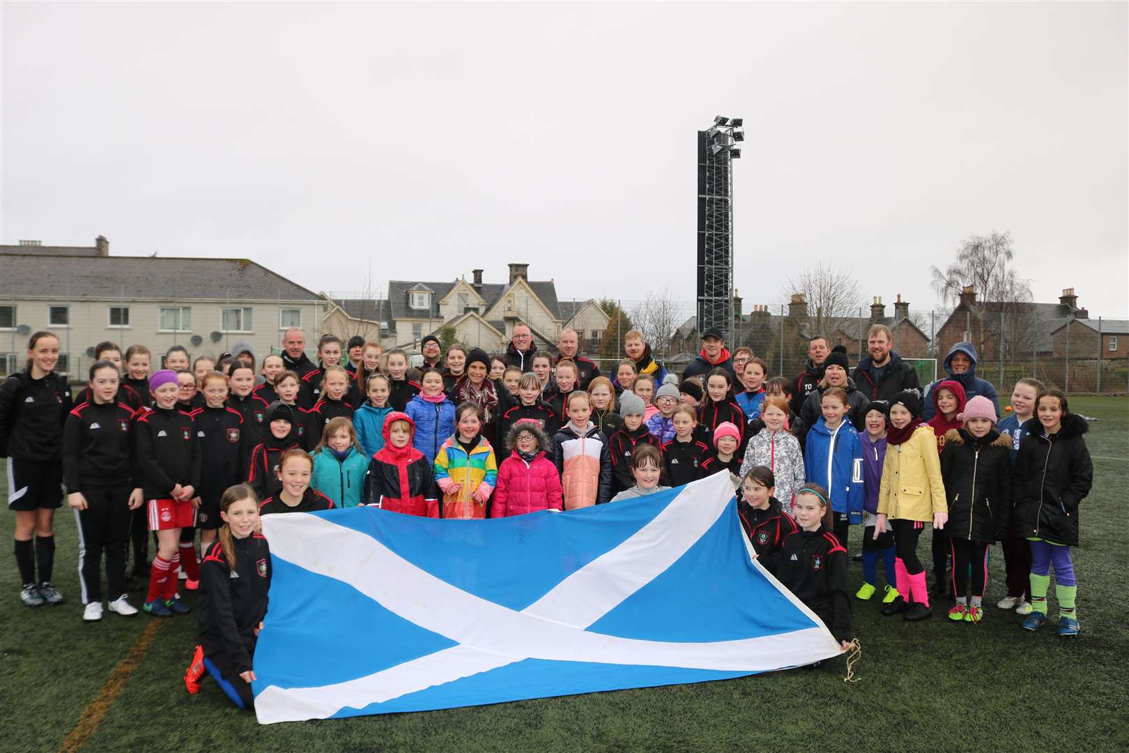 City of Downey ambassador Claudia Echeverria was presented with a giant Saltire to take to home to California after watching Thistle Girls in action.