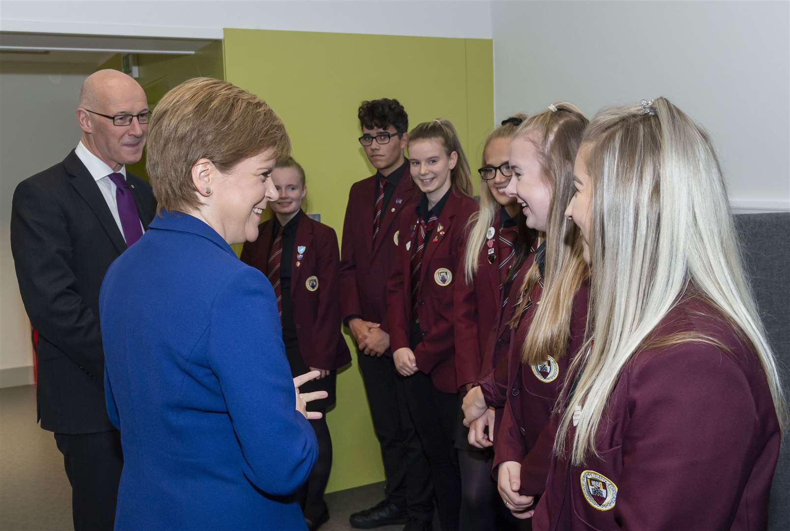 First Minister Nicola Sturgeon and education secretary John Swinney meeting pupils last year