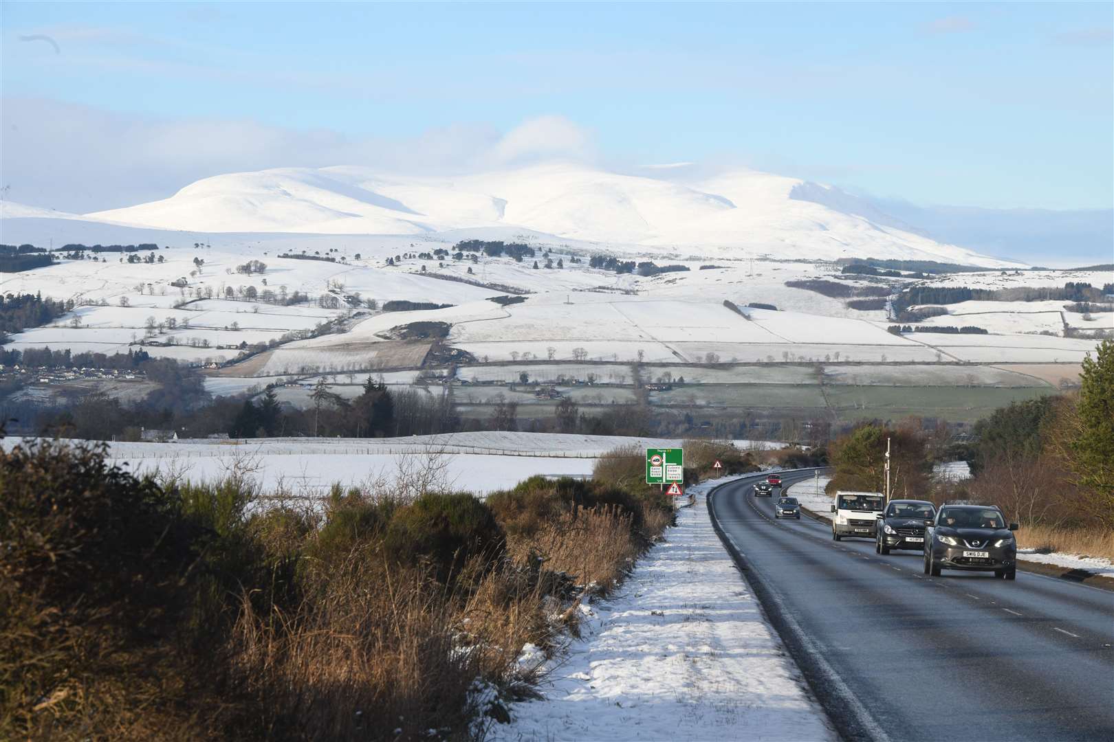 Snow on the A9 near the Culbokie junction. Snow thaw could play into localised flooding, according to the Met Office. Picture: James Mackenzie.