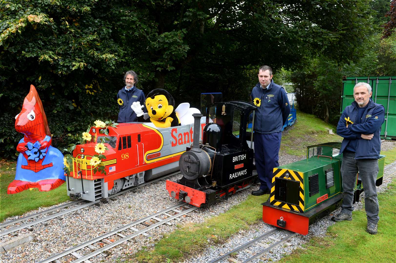 The mini railway at Whin Park has had a record year of income which now all goes to Highland Hospice..Bobby the Bee with drivers Robin Forrest(left),Ryan Munro and Jim Blyth..Picture: Gary Anthony..