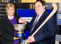 Lorraine Christie, The Co-operative Food’s regional operations manager, and Stuart Ramsay, member of The Co-operative Group’s Scotland and Northern Ireland board carried out the MacTavish Cup draw