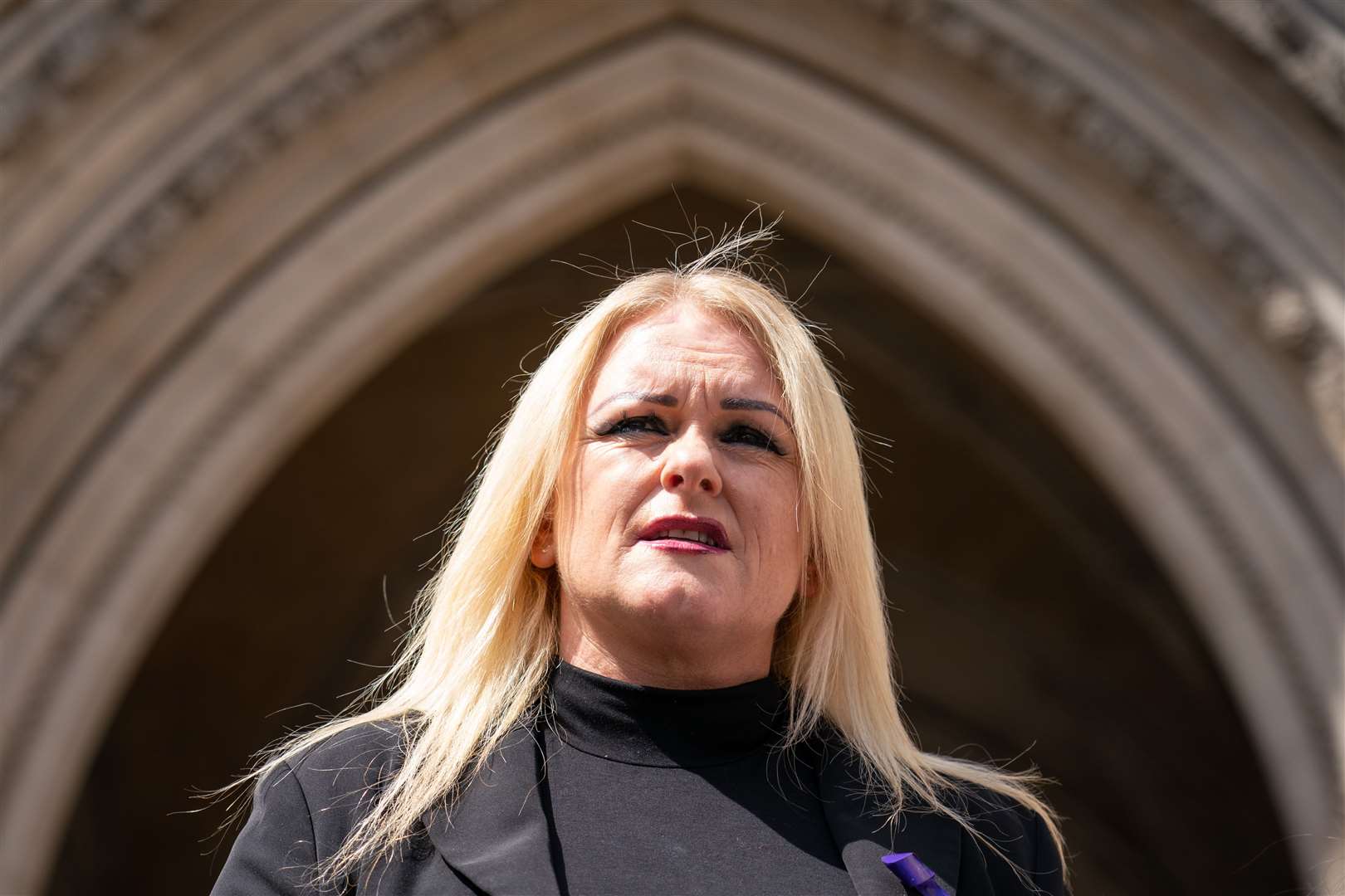 Hollie Dance speaks to the media outside the Royal Courts of Justice (Dominic Lipinski/PA)