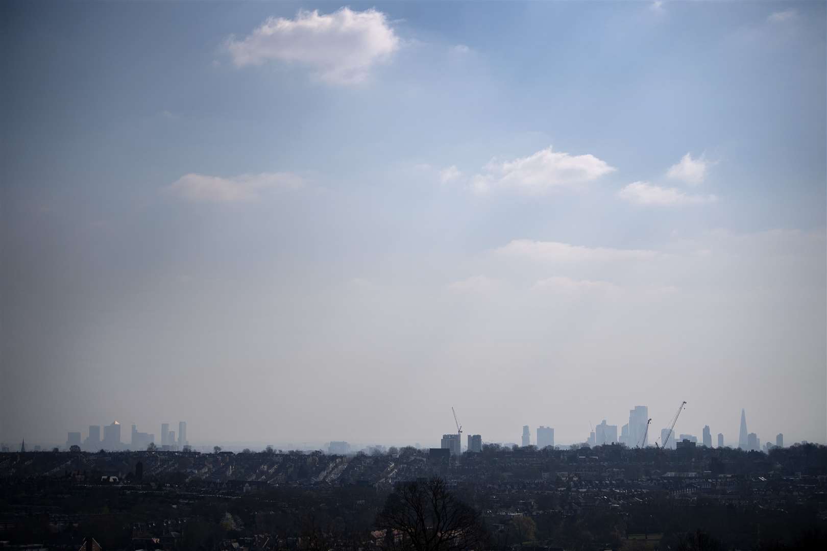 The London skyline viewed through the haze from Alexandra Palace, north London (Victoria Jones/PA)