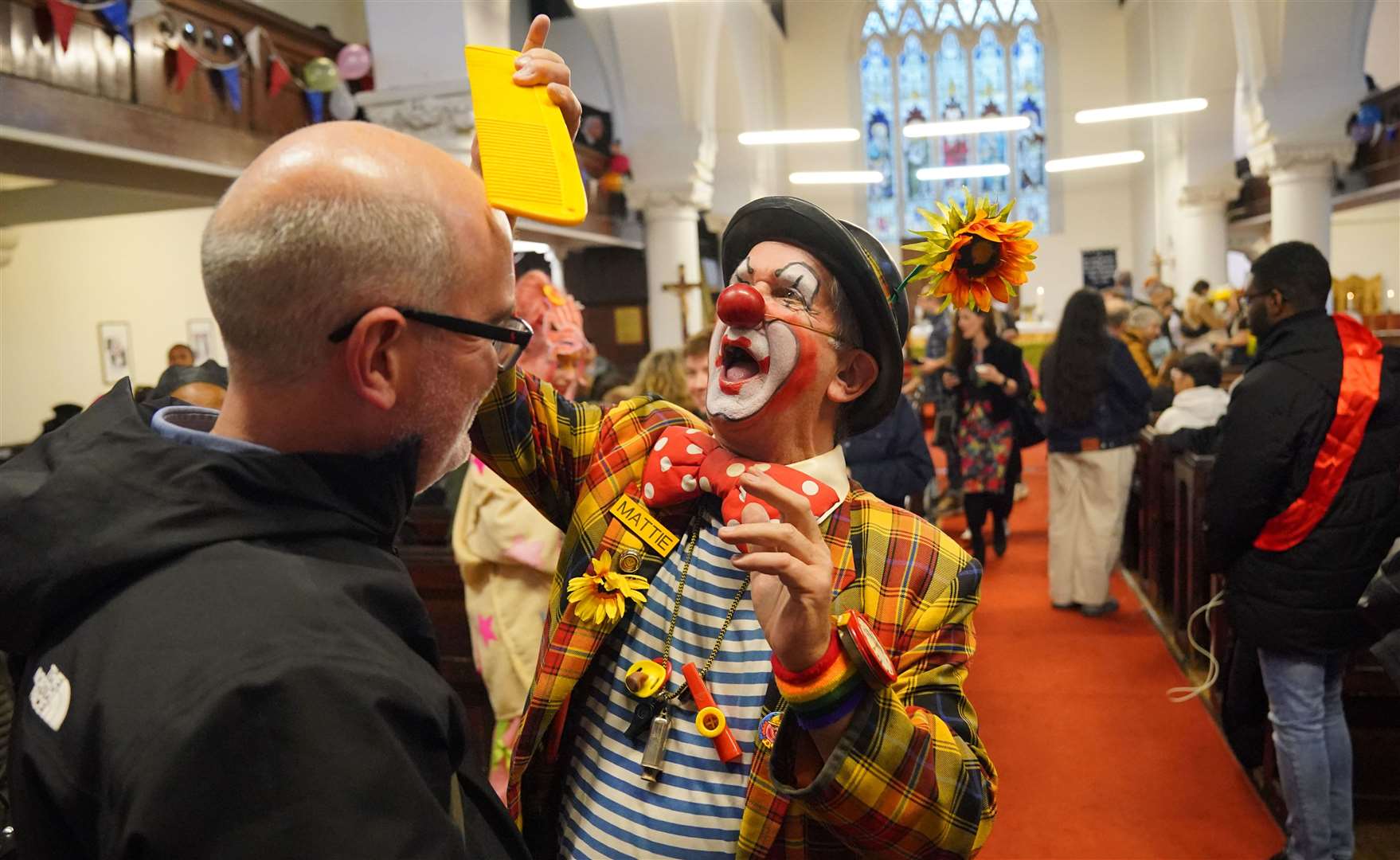 A clown at the Annual Grimaldi Clown Service (Jonathan Brady/PA)