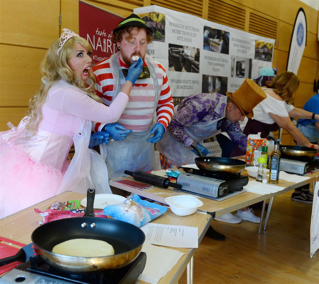 Taste of Nairn 2022.The Moray Mad Hatters try tattie scone competition.Picture Gary Anthony.
