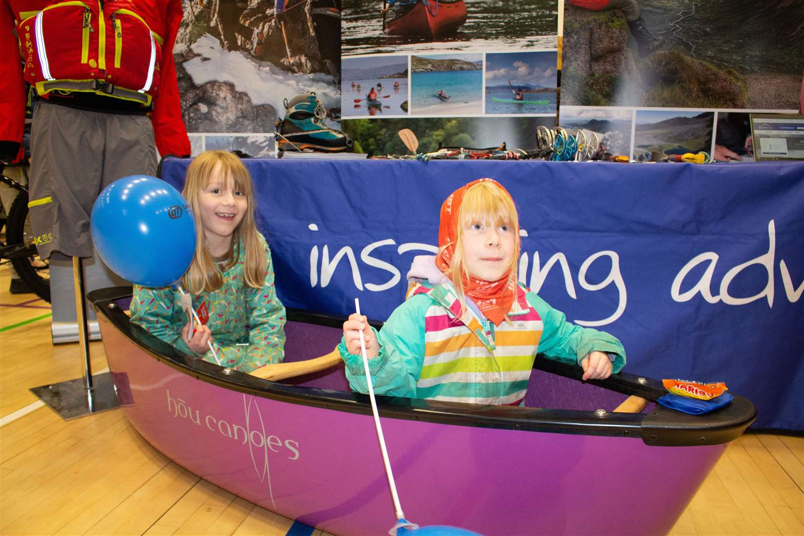 Trying out the open canoe at the Glenmore Lodge stand.