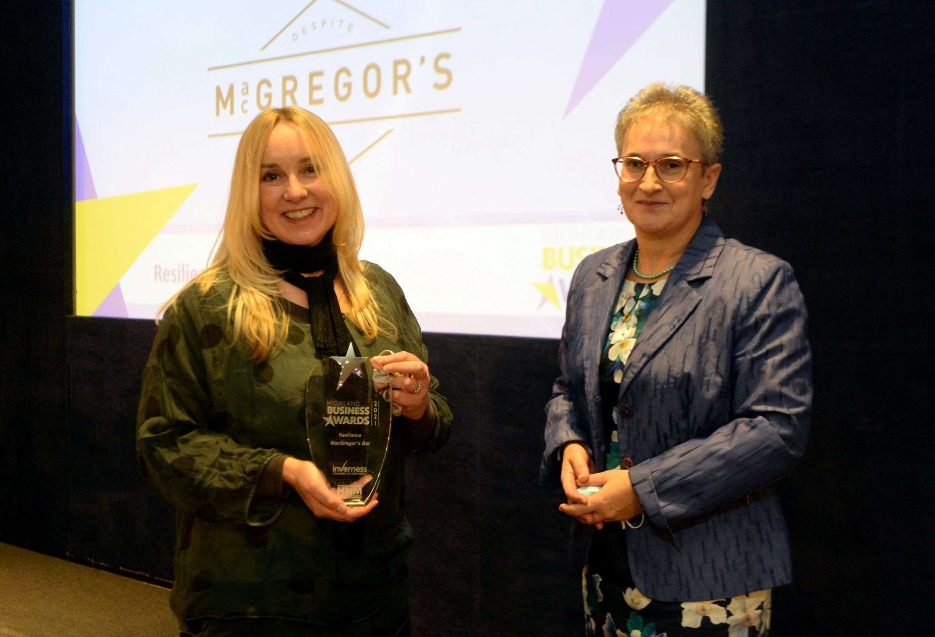 Jo De Sylva, MacGregor's, receives the Resilience Award from Trudy Morris at the 2021 Highland Business Awards.