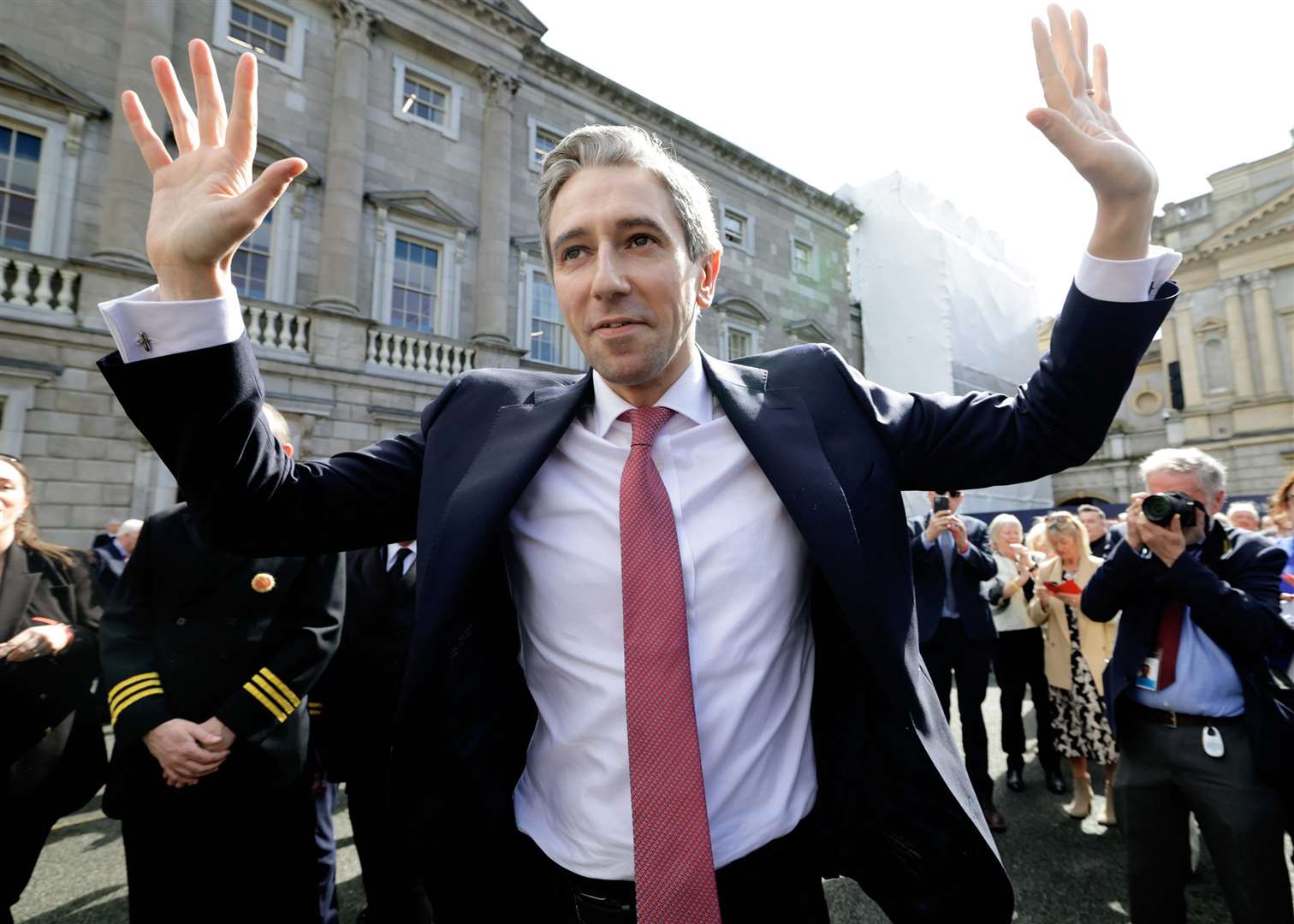 Simon Harris leaving the Dail, in Dublin, following the vote by Irish parliamentarians to elect him as Taoiseach (Maxwell Photography/PA)
