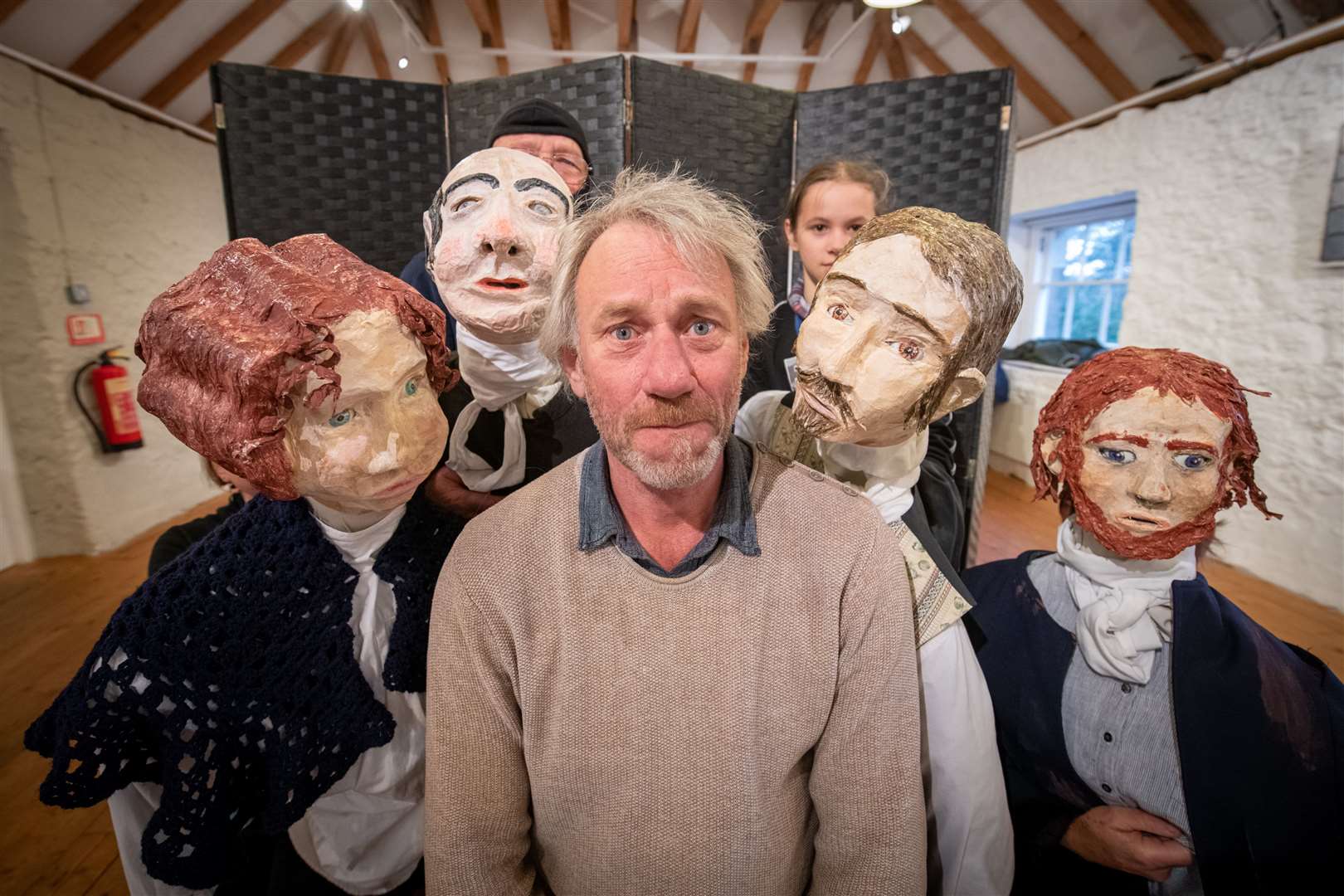 Producer and director Jon Palmer with the puppets. Picture: Callum Mackay