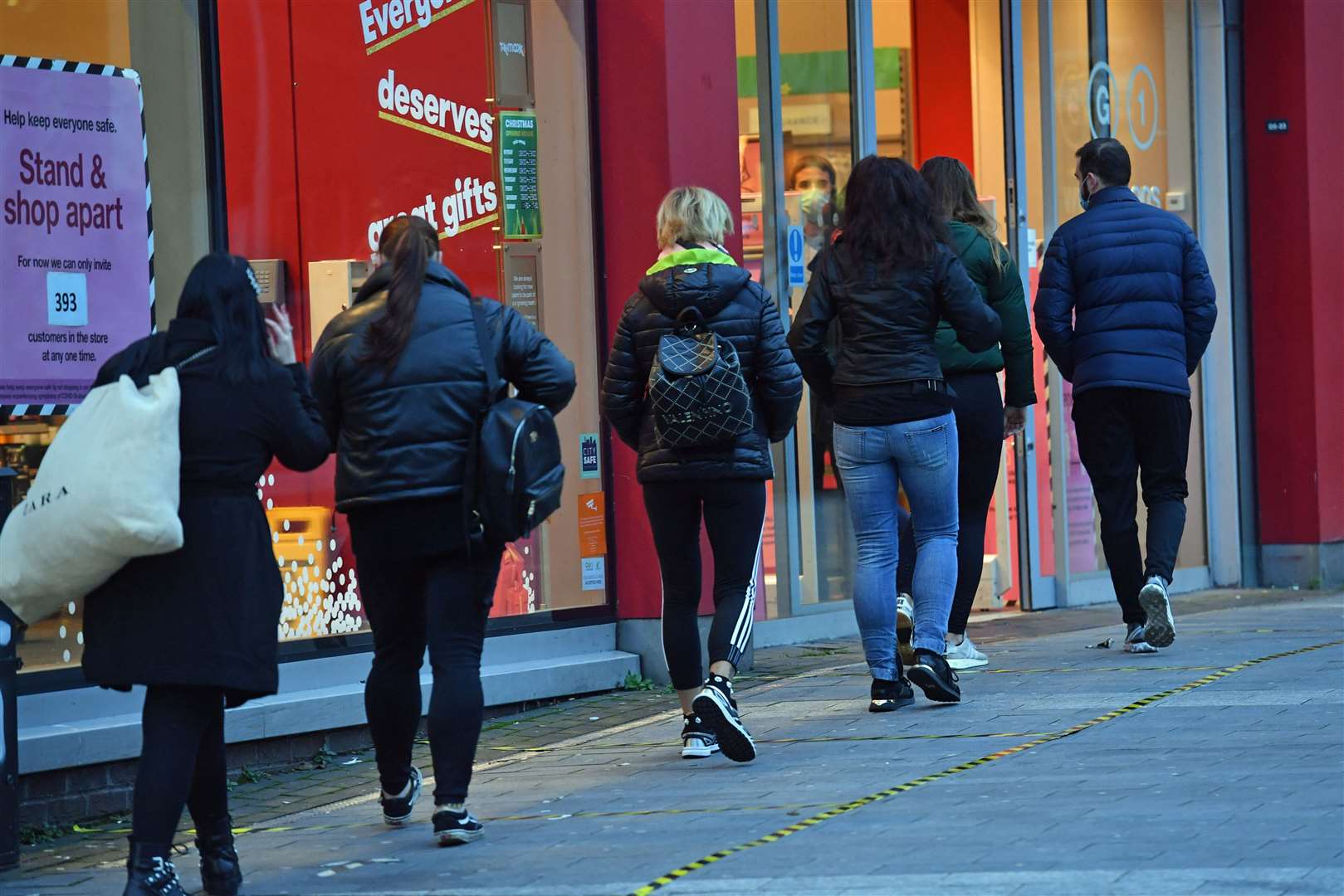 People queueing outside TK Maxx in Birmingham on the first day shops reopen (Jacob King/PA)