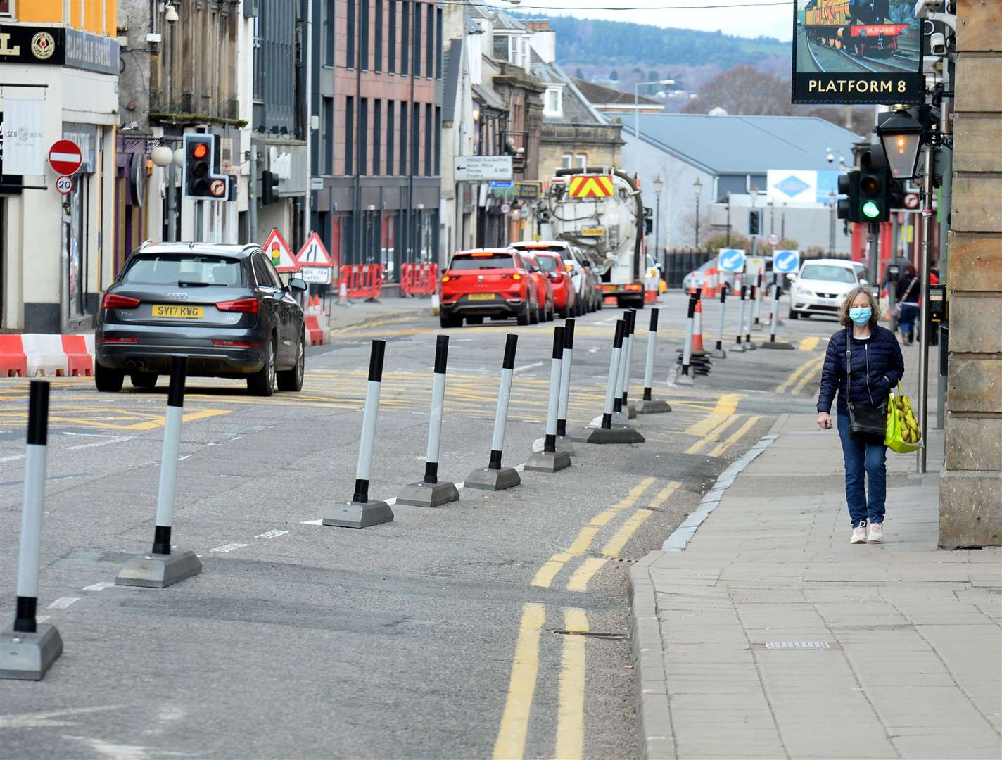The original Spaces for People resulted in barriers added to the city centre for social distancing and active travel including this one on Academy Street.