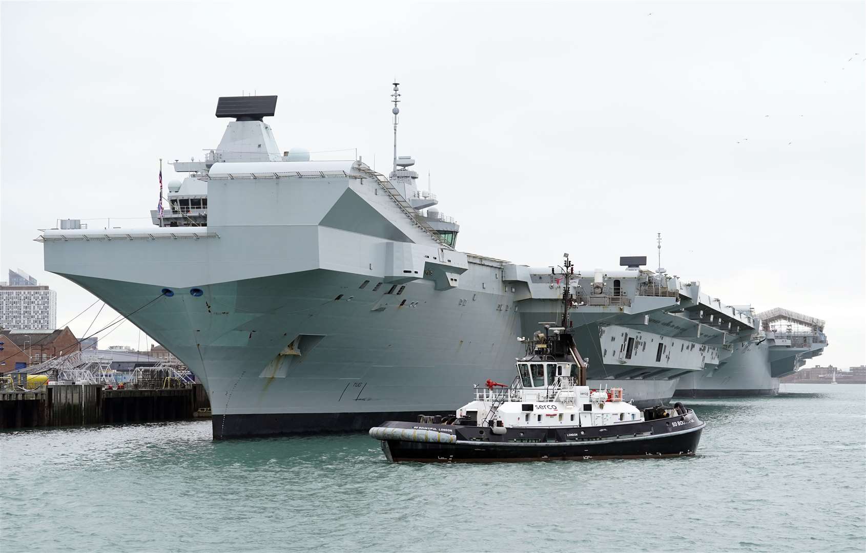 The Royal Navy aircraft carriers HMS Queen Elizabeth (left) and HMS Prince of Wales alongside at HMNB Portsmouth on Sunday (Andrew Matthews/PA)