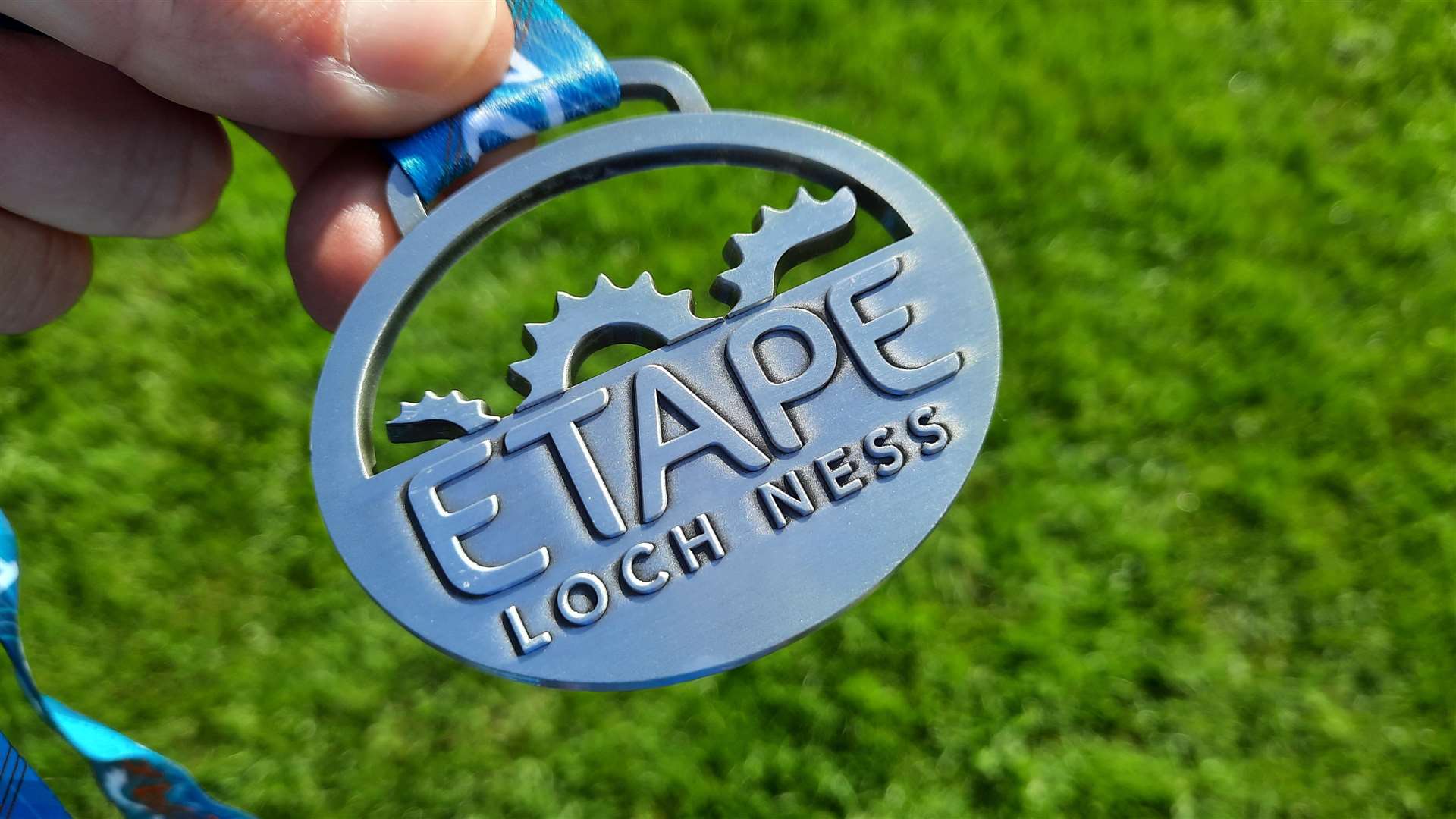 The 2021 Etape Loch Ness medal.