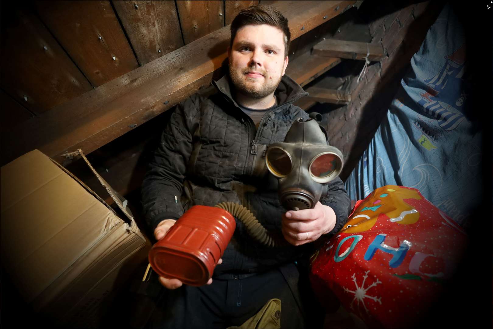 Shayne Macdonald in his loft where he found the gas mask. Picture: James Mackenzie