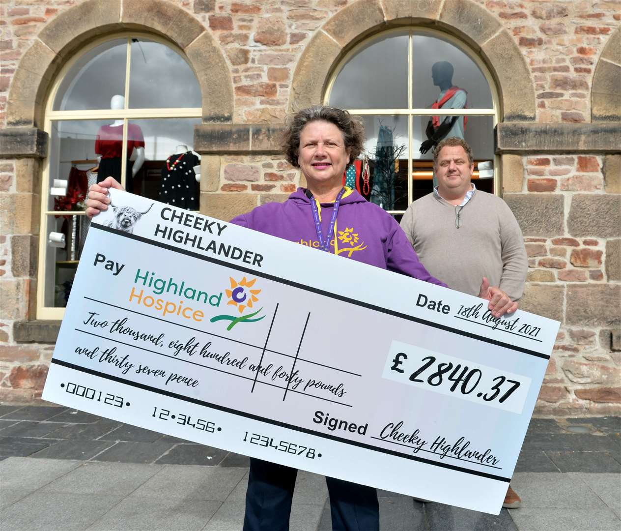 Marcus Salter, of Cheeky Highlander antiques, Bunchrew, raised over Â£2800 for Highland Hospice with the help of a chainsaw artist...Katie Gibb and Marcus Salter outside the Highland Hospice shop, Falcon Square.3+...Picture: Callum Mackay..