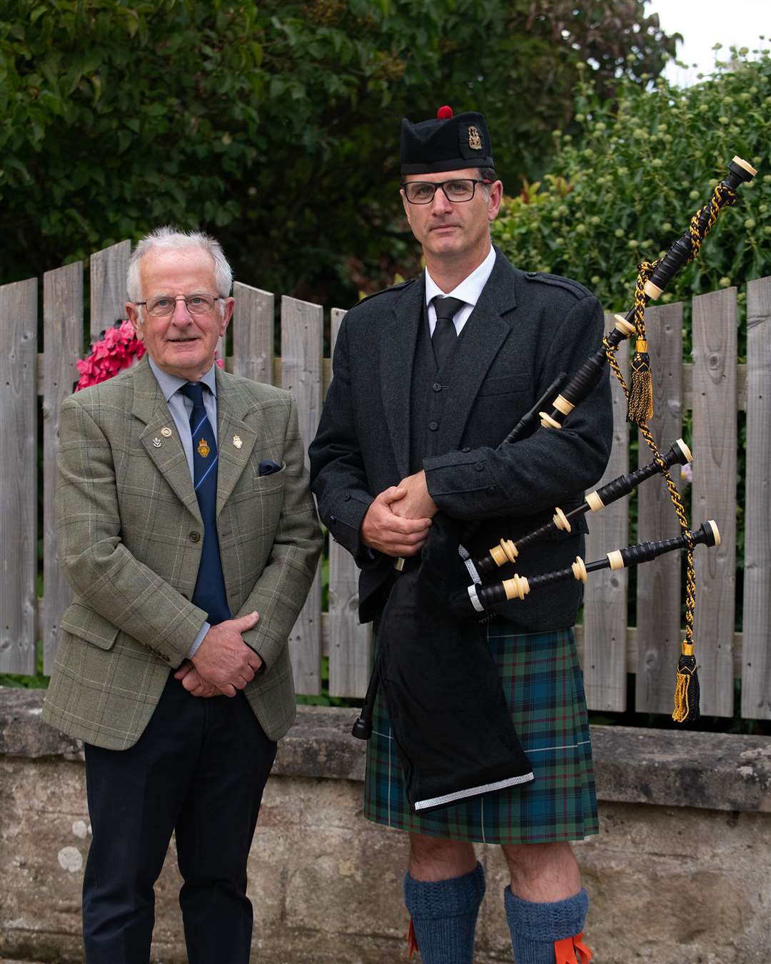 Bob Towns and new Nairn Pipe Band Pipe Major Kevin Reid.