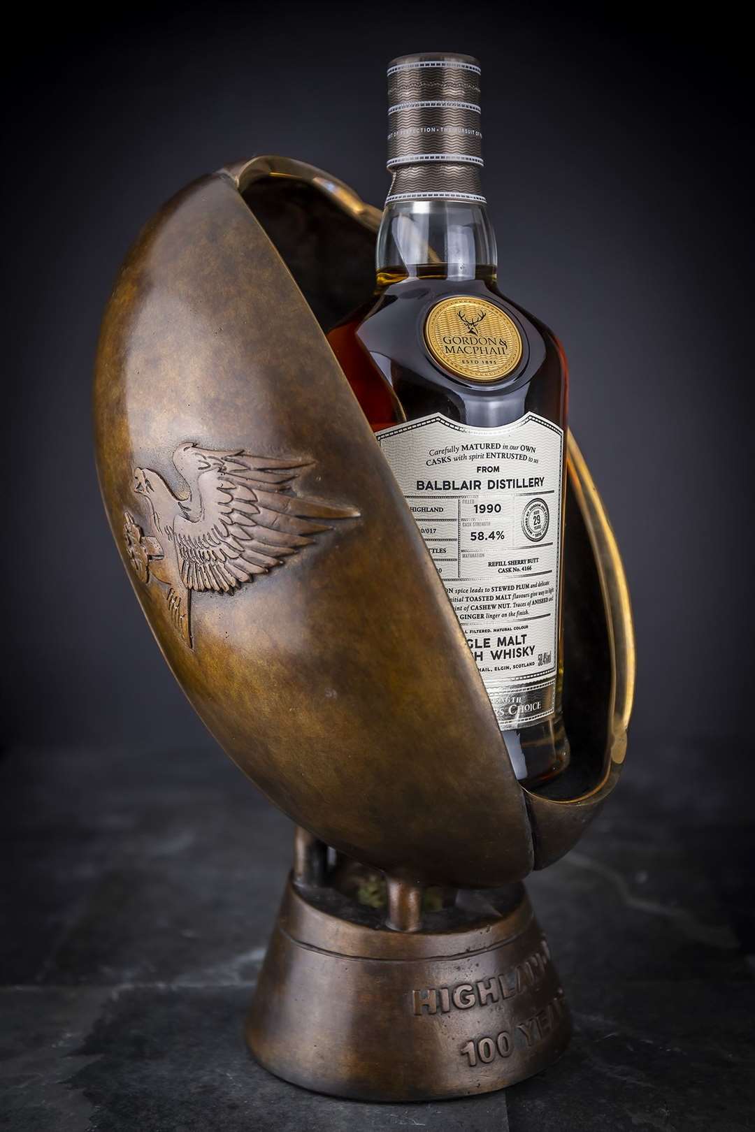 The bottle of 29-year-old Balblair whisky is housed in bronze plinth created exclusively for Highland Rugby Football Club by Black Isle Bronze.