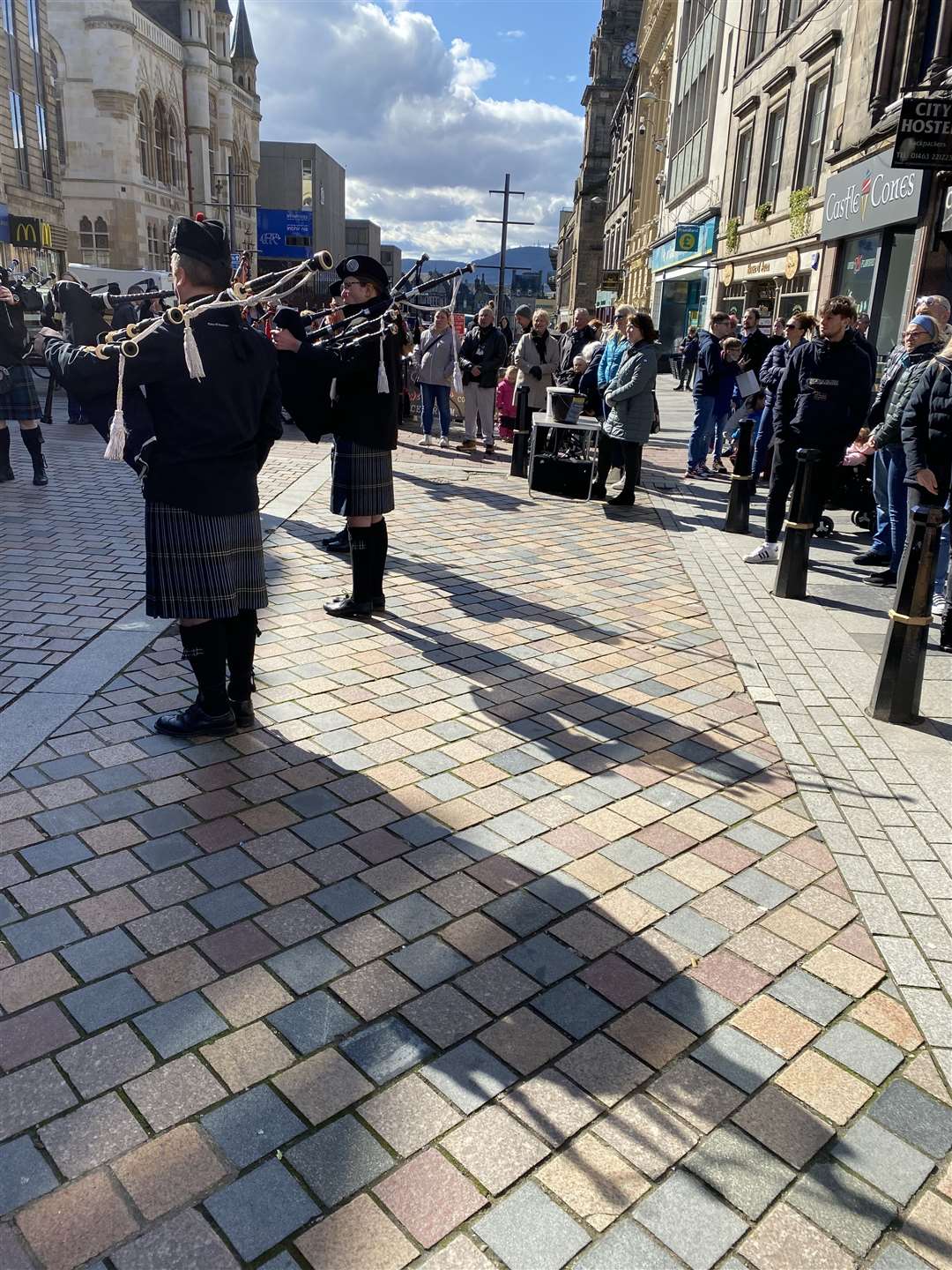 City of Inverness Youth Pipe Band perform in High Street in aid of Ukraine.
