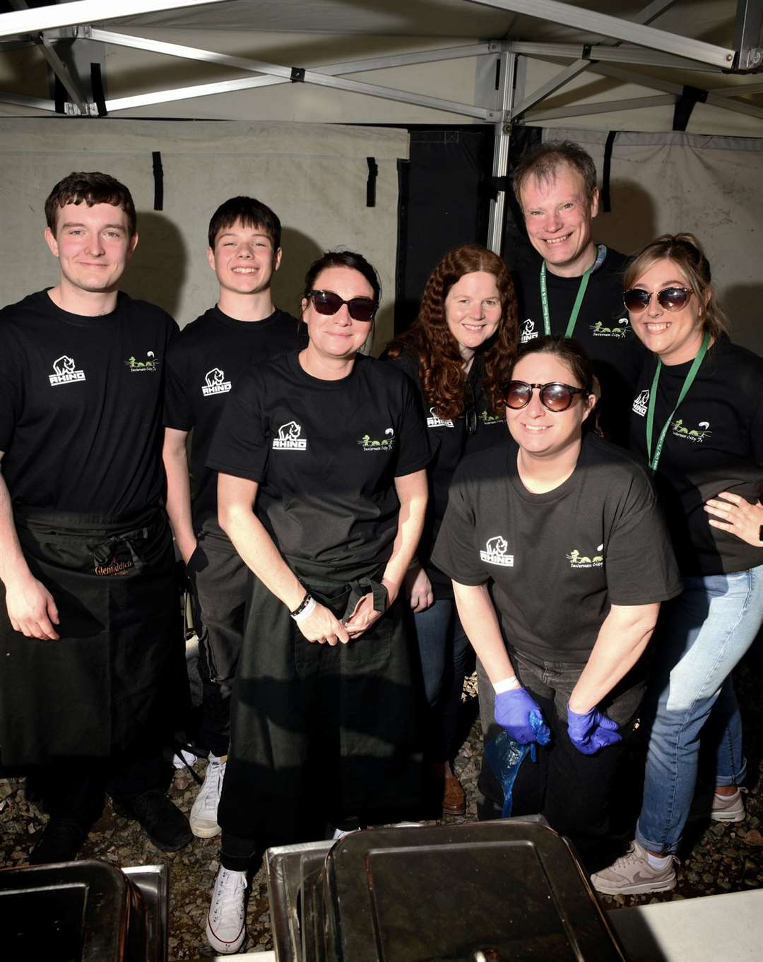 Inaugural Highland Beer, Gin & Whisky Festival 2022: Highland Rugby Club Under 15s coaches serving food. Picture: James Mackenzie.
