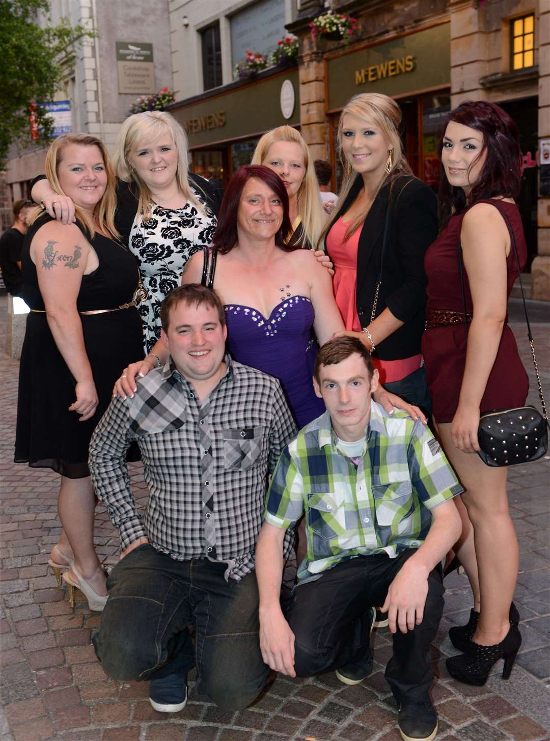 Lizzie Black (purple, centre) enjoys her birthday night out at Lauders with friends and family. Picture: Gary Anthony.