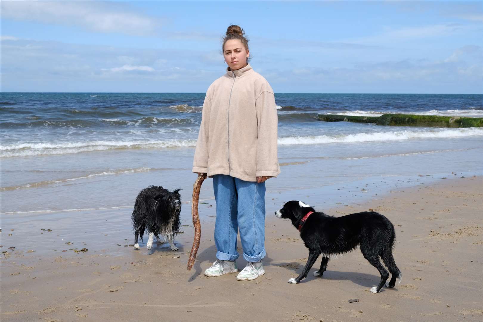 Elena was pictured on the beach with her dogs in June 2020.